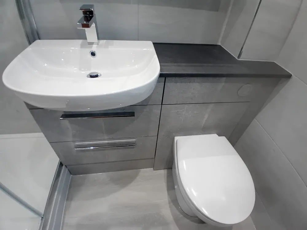 Newly fitted bathroom sink and vanity unit installed by APG Plumbing & Heating Services Ltd in Cannock